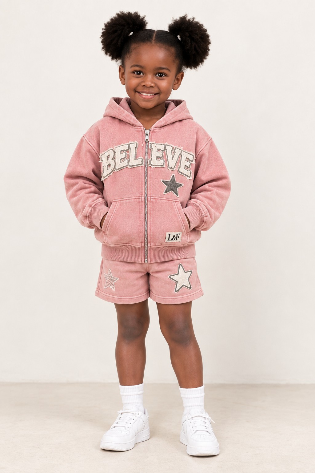 Believe Set in washed rose on a girl aged five